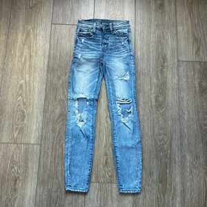 SOLD- AE Distressed Hi Rise Jegging